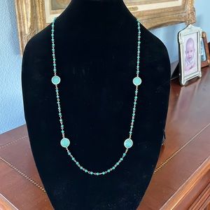 Aqua colored and turquoise colored cut crystal bead necklace.